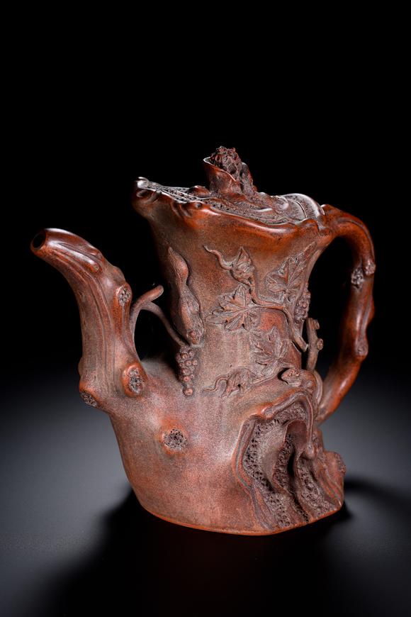 HUNG YUN ZHAI AUCTION HOUSE INCZhu Kexin-marked Squirrel and Grape Tree Stump Yixing Zisha Teapot