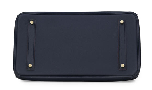 Piguet - H?tel des VentesHermès, sac Birkin 35 Contour en cuir Epsom bleu Indigo et finition rouge, 2016 éd. limitée, tirette et clochette avec 2 clefs et cadena