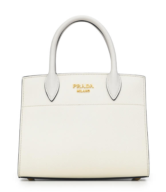 Piguet - H?tel des VentesPrada, sac City mini Bibliothèque en cuir saffiano blanc avec soufflet rose, bandoulière