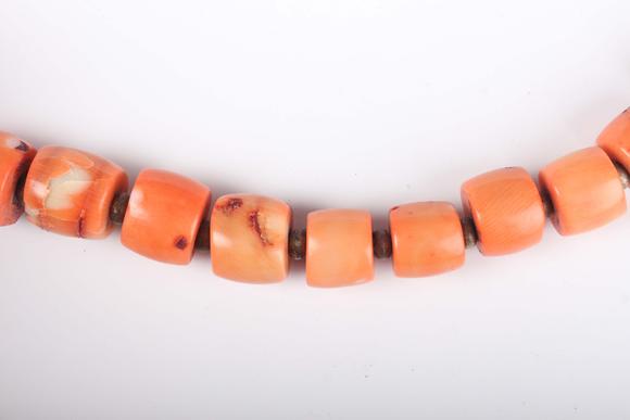 TooveysA single row necklace of graduated barrel form dyed coral beads, Nor