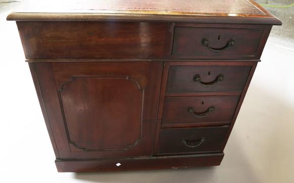 TooveysA good late George III mahogany twin-pedestal desk, in the manner of