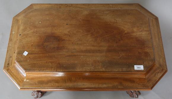 TooveysA George IV mahogany wine cooler of panelled sarcophagus form, the s