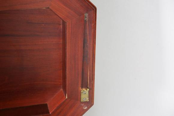 TooveysA George IV mahogany wine cooler of panelled sarcophagus form, the s