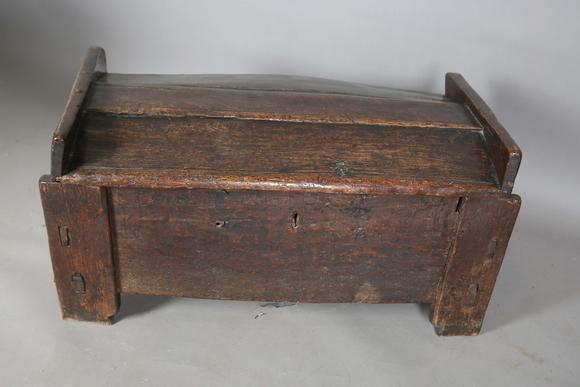 TooveysA rare 16th century boarded oak clamp-front ark or meal chest, the d