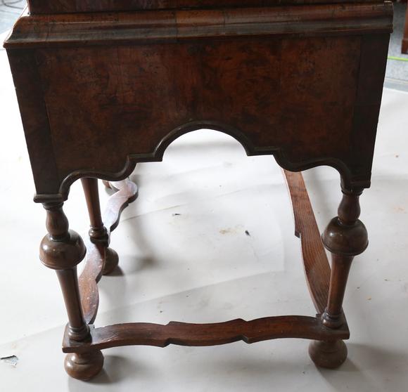 TooveysA George I and later burr walnut chest-on-stand with overall feather