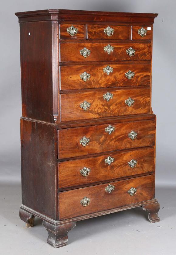 TooveysA George III mahogany secrétaire chest-on-chest, fitted with nine oa