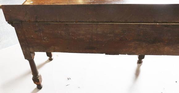 TooveysAn 18th century provincial oak dresser base, fitted with three drawe