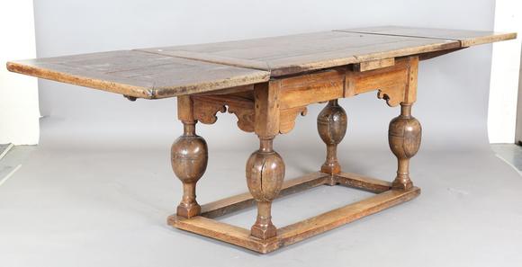 TooveysA 17th century oak draw-leaf refectory table, the rectangular top ra
