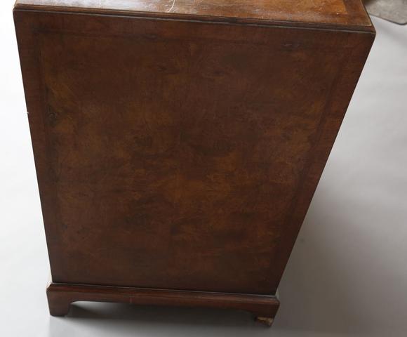 TooveysA 20th century George I style walnut kneehole desk with overall feat