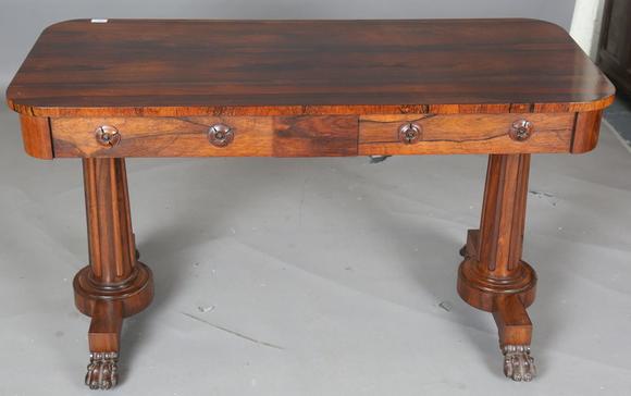 TooveysAn early Victorian rosewood centre table, fitted with two frieze dra
