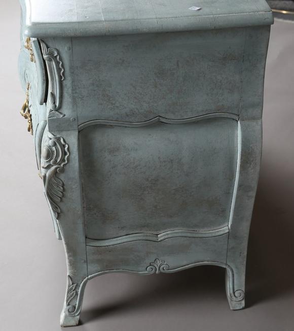 TooveysA 20th century French rococo style painted three-drawer commode, the