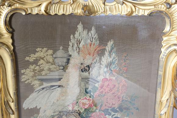 TooveysAn impressive mid-Victorian giltwood firescreen, the rococo style fr