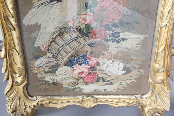 TooveysAn impressive mid-Victorian giltwood firescreen, the rococo style fr