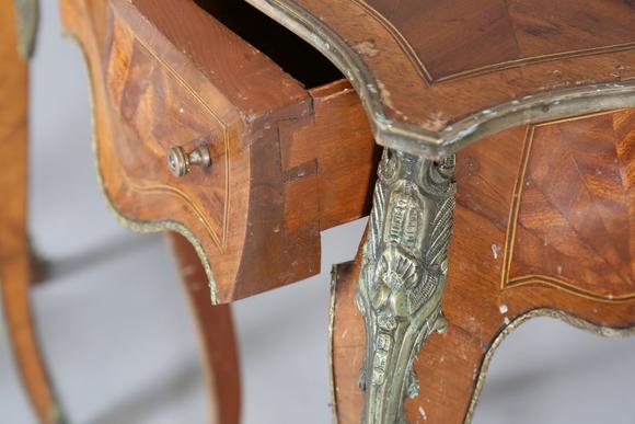 TooveysA pair of 20th century French mahogany bedside tables of shaped bomb