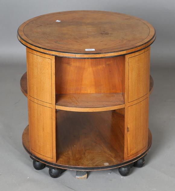 TooveysAn Art Deco walnut revolving book table by Heal & Son Ltd, the quart