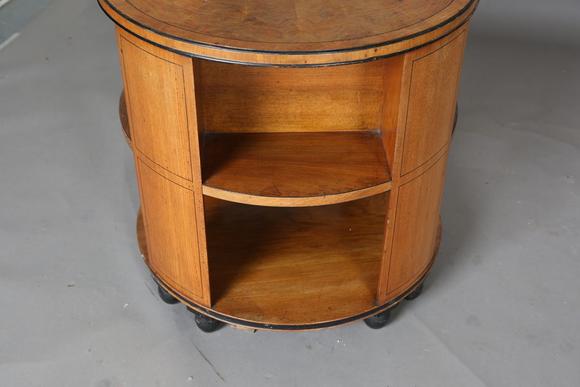 TooveysAn Art Deco walnut revolving book table by Heal & Son Ltd, the quart