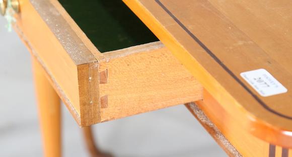 TooveysA late 20th century satinwood side table, fitted with a single friez