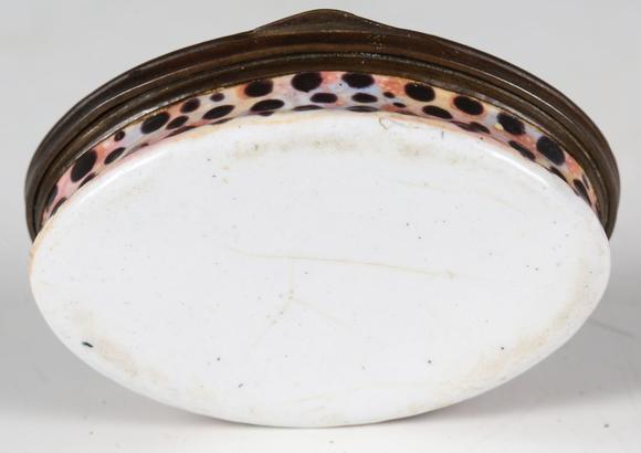 TooveysAn 18th century South Staffordshire enamel oval snuff box, decorated
