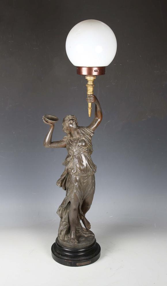 TooveysA late 19th century cast spelter figural table lamp in the form of a