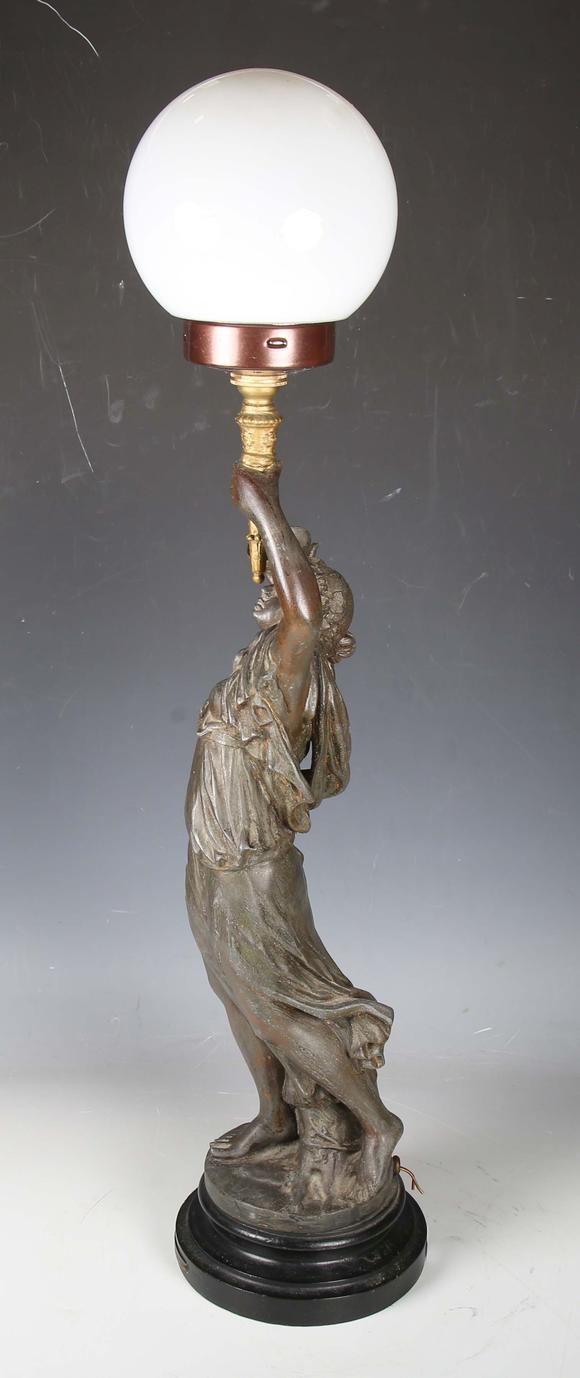 TooveysA late 19th century cast spelter figural table lamp in the form of a