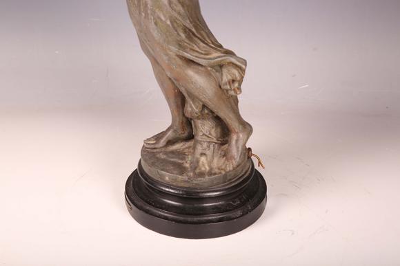 TooveysA late 19th century cast spelter figural table lamp in the form of a