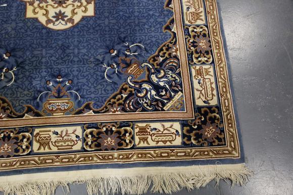 TooveysA Chinese carpet, late 20th century, the blue field with a floral me