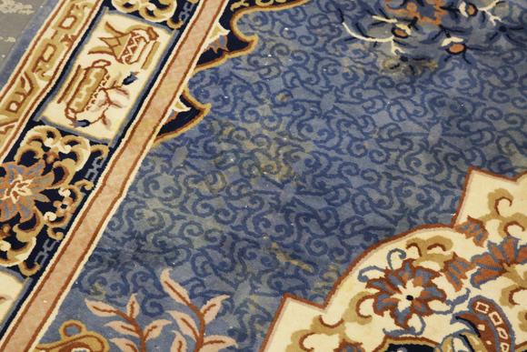 TooveysA Chinese carpet, late 20th century, the blue field with a floral me