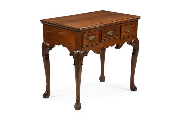 DreweattsA GEORGE II MAHOGANY AND WALNUT SIDE TABLE OR LOWBOY, PROBABLY IRISH, CIRCA 1745