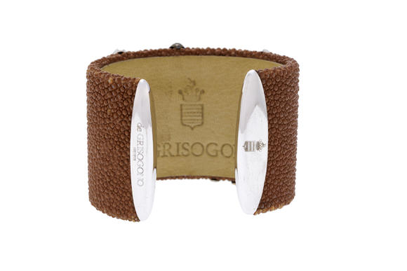 Piguet - H?tel des VentesDe Grisogono, bracelet manchette en galuchat orné d'éléments fuselés en or gris 750 dont certains pavés de diamants noirs