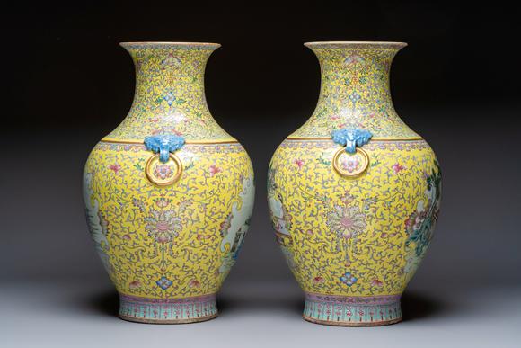 Rob Michiels AuctionsA pair of large Chinese famille rose yellow-ground 'Hu' vases with narrative design, Qianlong mark, Republic