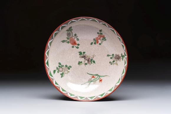 Rob Michiels AuctionsAn unusual Chinese famille verte copper-red-ground shallow bowl with floral design, 19th C.
