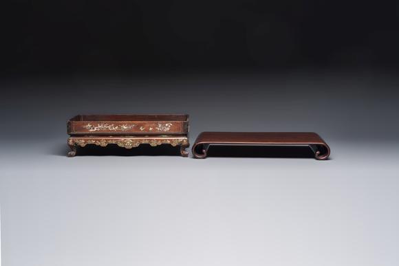 Rob Michiels AuctionsA Chinese or Vietnamese mother-of-pearl-inlaid wooden tray and a Chinese hongmu stand, 19/20th C.