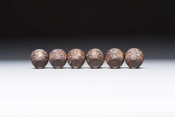Rob Michiels AuctionsA group of 12 Chinese silver-lined coconut 'Shou 壽' bowls and cups, Wang Hengxin 王恆馨 marks, 19/20th C.