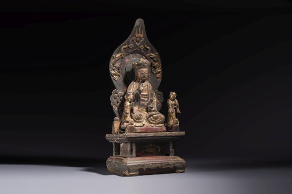 Rob Michiels AuctionsA Chinese gilt-lacquered wooden Bodhisattva and attendants on a throne, Qing