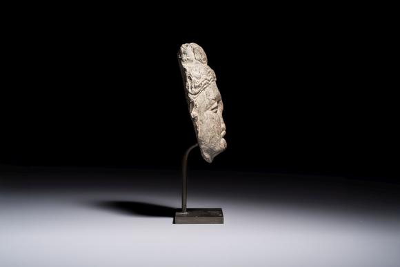 Rob Michiels AuctionsA Gandhara grey schist relief fragment of a Bodhisattva head, 3rd/4th C.
