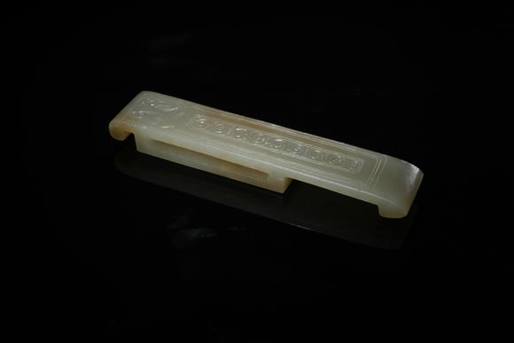 北京懋隆拍賣清 玉卷云紋劍璏