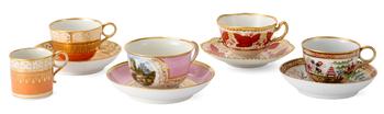 Lot 19 A GROUP OF FOUR WORCESTER PORCELAIN TEACUPS AND SAUCERS