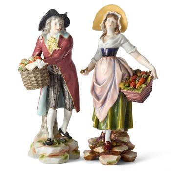 Lot 36 A LUDWIGSBURG PORCELAIN FIGURE OF A FRUIT SELLER