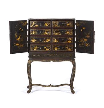 A Japanese lacquered cabinet on stand