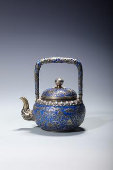 A Silver Enameled Wine Pot with Auspicious Buddhist Symbols and Dragon-Form Handle, China, 18th centuries