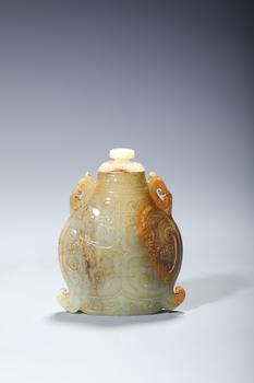 A White Jade Covered Vase with Dragon and Archaic Scroll Reliefs, China, 14th–17th centuries