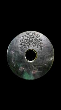 A Dark Green Jade Bi Disc with Incised Decoration, Neolithic, Circa 3300–2300 C BC Pr.