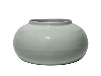A Chinese White-glazed plum blossom water pot, Ming Dynasty Pr.