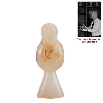 A CHINESE CARVED STANDING JADE FIGURE