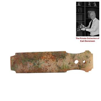 A CHINESE ARCHAIC CARVED JADE FITTING