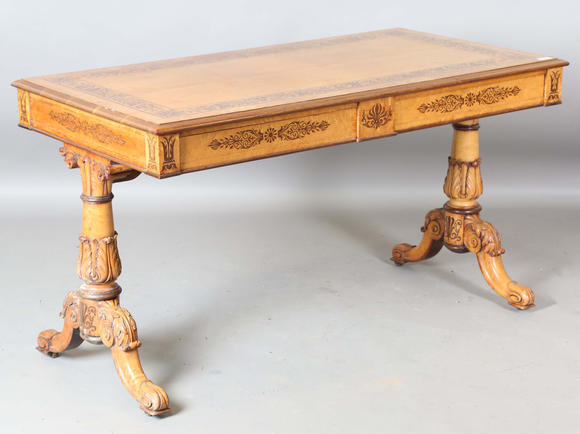Tooveys|中西方古董藝術(shù)A Regency bird’s eye maple and foliate inlaid library table, in the manner of Gillows of Lancaster, the moulded top above two frieze drawers, twin su