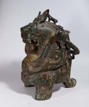 銅獸形尊