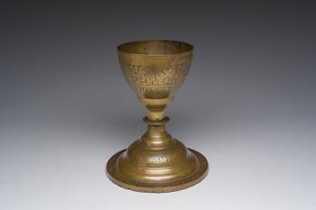 A Spanish bronze chalice with engraved design, 17th C.