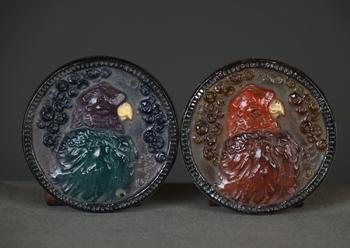 Argy Rousseau Collection: two ‘parrot’ pendants in…