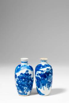 Qing Dynasty, Ca. AD 1644 - 1912. >
An engaging pair of porcelain snuff bottles of ovoid form wit